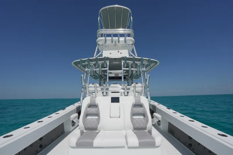 Slide: The Image of 2024 Freeman 42 boat with dual seats and tower on open ocean. - 34