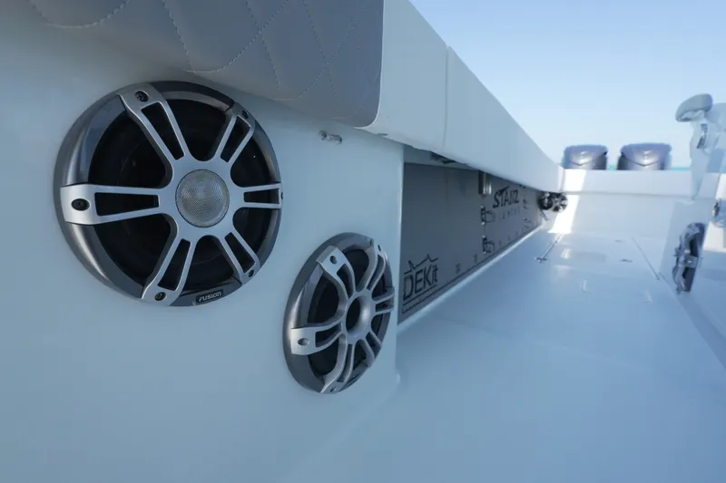 Slide: The Image of 2024 Freeman 42 boat deck with Fusion speakers and DEKit flooring. - 56