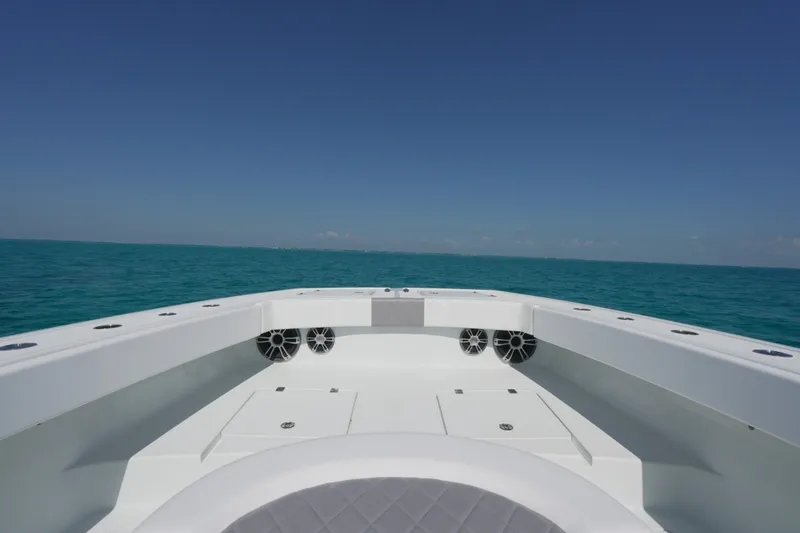 Slide: The Image of 2024 Freeman 42 boat deck with ocean view under clear blue sky. - 35