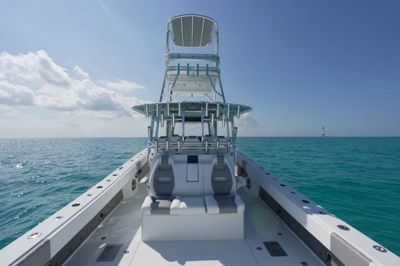 Slide: The Image of 2024 Freeman 42 boat on open sea under clear blue sky. - 47