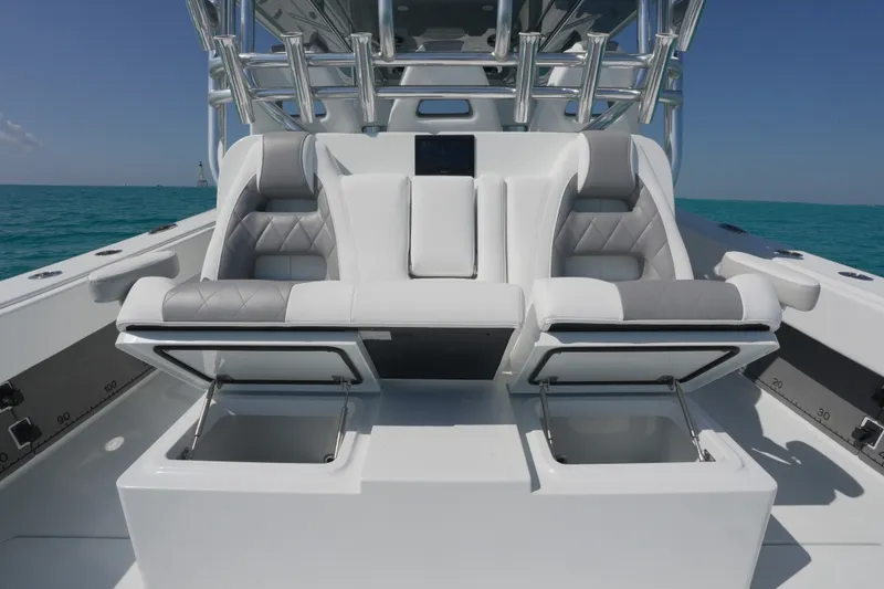 Slide: The Image of Luxury seating on 2024 Freeman 42 boat with ocean backdrop. - 57