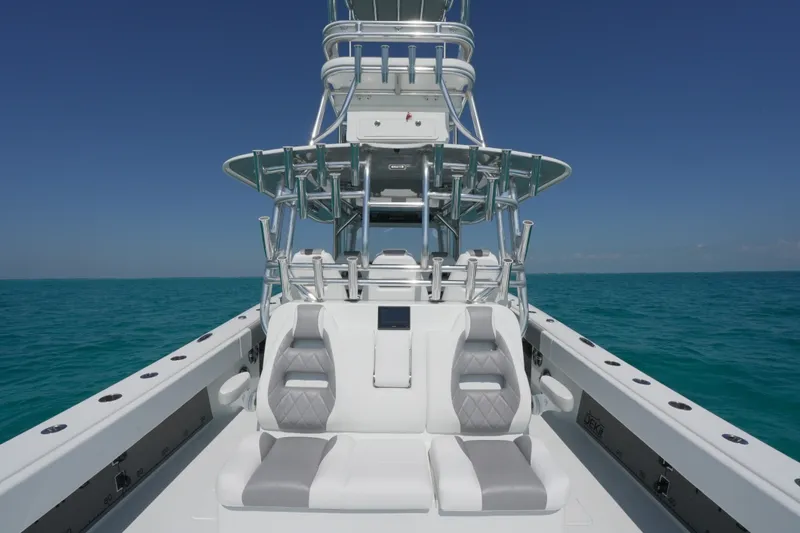 Slide: The Image of 2024 Freeman 42 boat with luxurious seating on open ocean. - 33