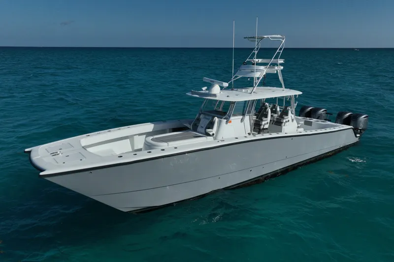 The Image of 2024 Freeman 42 boat on clear blue ocean water. - 0