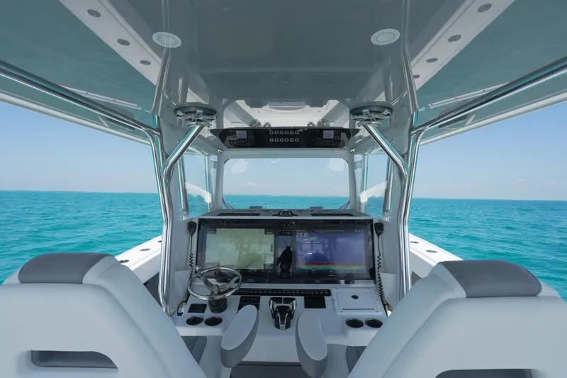 Slide: The Image of Interior view of 2024 Freeman 42 boat cockpit with ocean backdrop. - 32