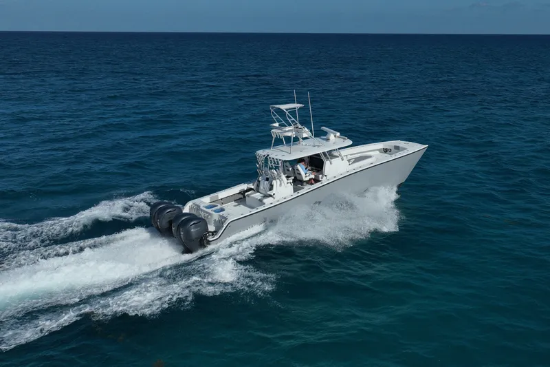 Slide: The Image of 2024 Freeman 42 boat cruising on open ocean waters. - 27