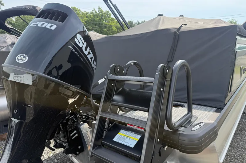 Slide: The Image of 2027 Viaggio x22u boat with Suzuki 200 engine and covered deck. - 33