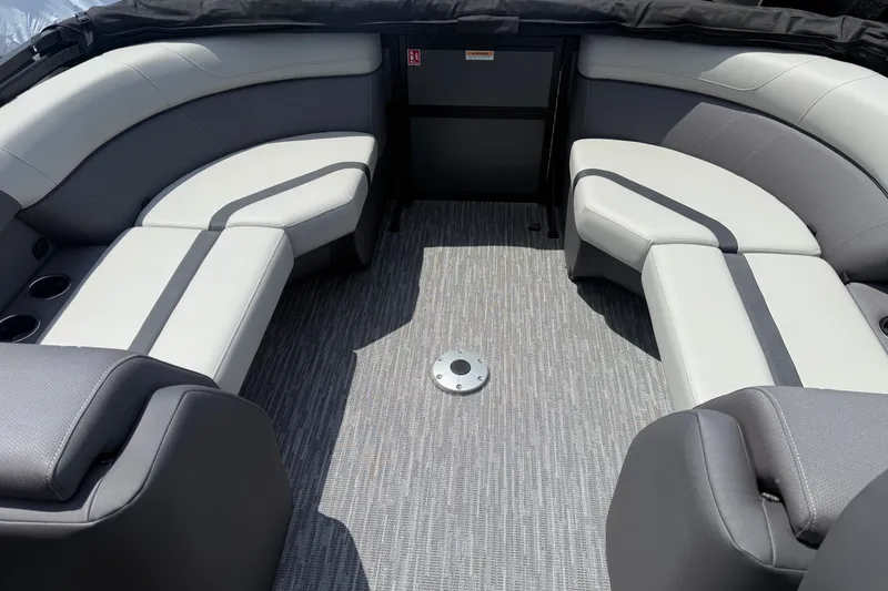 Slide: The Image of Interior of 2027 Viaggio x22u boat with gray seating and carpeted floor. - 14
