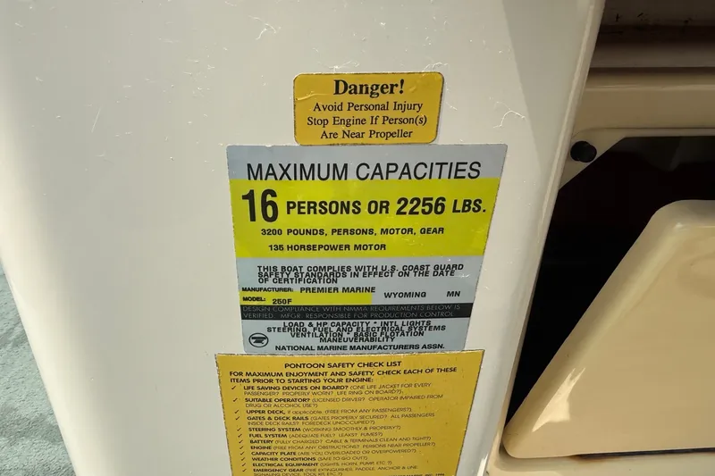 Slide: The Image of Capacity label on 1998 Premier SunSation 250 boat, max 16 persons or 2256 lbs. - 14