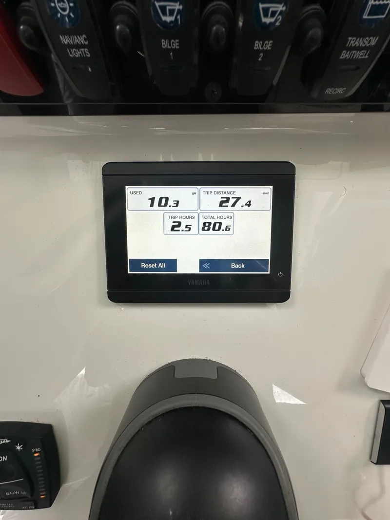 Slide: The Image of A digital display shows boat data such as usage, distance, and operating hours. - 10