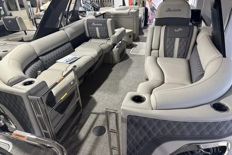 Slide: The Image of Luxurious interior of 2025 Barletta LUSSO 23QSSA pontoon boat with plush seating. - 15