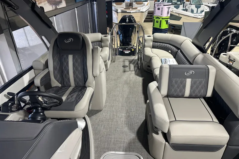 Slide: The Image of 2025 Barletta LUSSO 23QSSA luxury boat interior with plush seating and modern design. - 6
