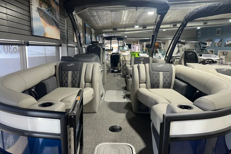 Slide: The Image of 2025 Barletta LUSSO 23QSSA pontoon boat interior with luxurious seating and modern design. - 3