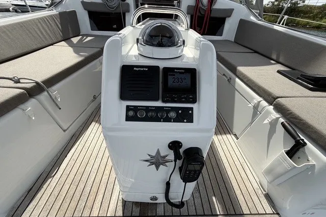Slide: The Image of Cockpit of 2022 Jeanneau Sun Odyssey 410 sailboat with navigation equipment. - 11