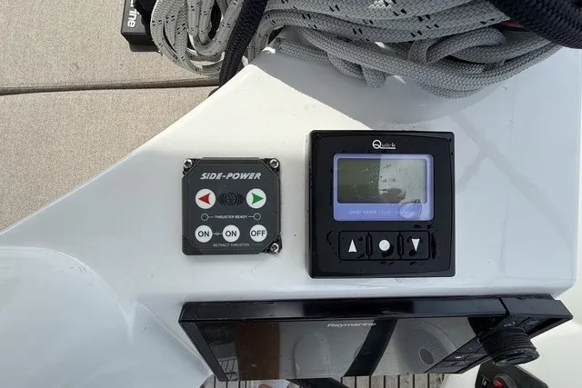 Slide: The Image of Control panel on Jeanneau Sun Odyssey 410 yacht, featuring Side-Power and Quick systems, 2022 model. - 13