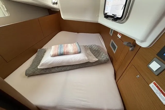 Slide: The Image of Cozy cabin bed in 2022 Jeanneau Sun Odyssey 410 yacht interior. - 50