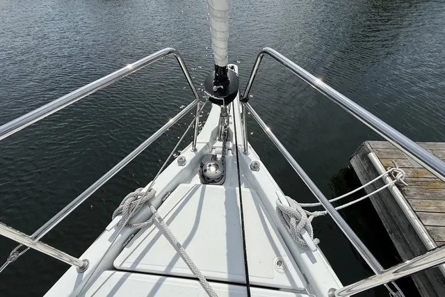 Slide: The Image of Bow of 2022 Jeanneau Sun Odyssey 410 sailboat with stainless steel railings. - 30