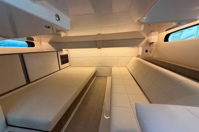 Slide: The Image of Luxurious interior cabin of 2023 Regal 36 XO yacht with plush seating. - 38