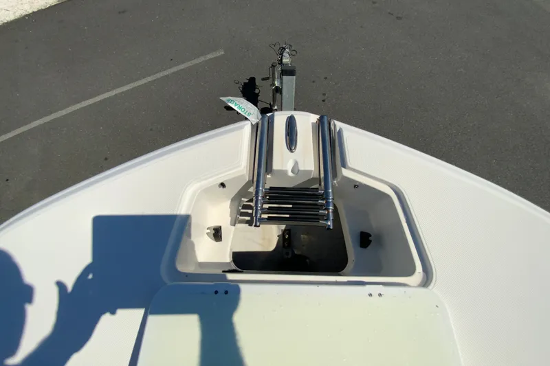 Slide: The Image of Bow view of 2010 Hurricane SunDeck Sport 200 OB boat with ladder. - 17
