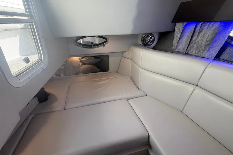 Slide: The Image of Interior cabin of 2018 Formula 330 Crossover Bowrider I/O with plush seating. - 19