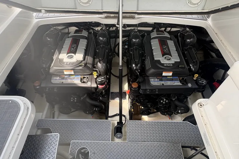 Slide: The Image of Engine compartment of 2018 Formula 330 Crossover Bowrider I/O with twin 6.2L engines. - 22