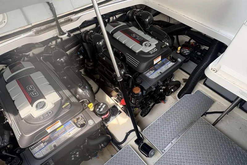 Slide: The Image of Engine compartment of a 2018 Formula 330 Crossover Bowrider I/O with twin 6.2L engines. - 24