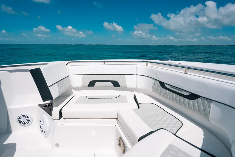 Slide: The Image of 2023 Blackfin 272 CC boat interior with luxurious seating and ocean view. - 72