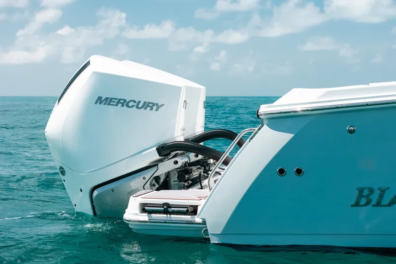 Slide: The Image of 2023 Blackfin 272 CC boat with Mercury engine on open water. - 37