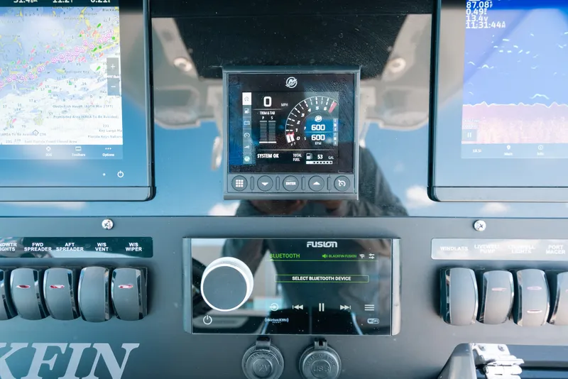 Slide: The Image of Dashboard of 2023 Blackfin 272 CC boat with navigation and control systems. - 64