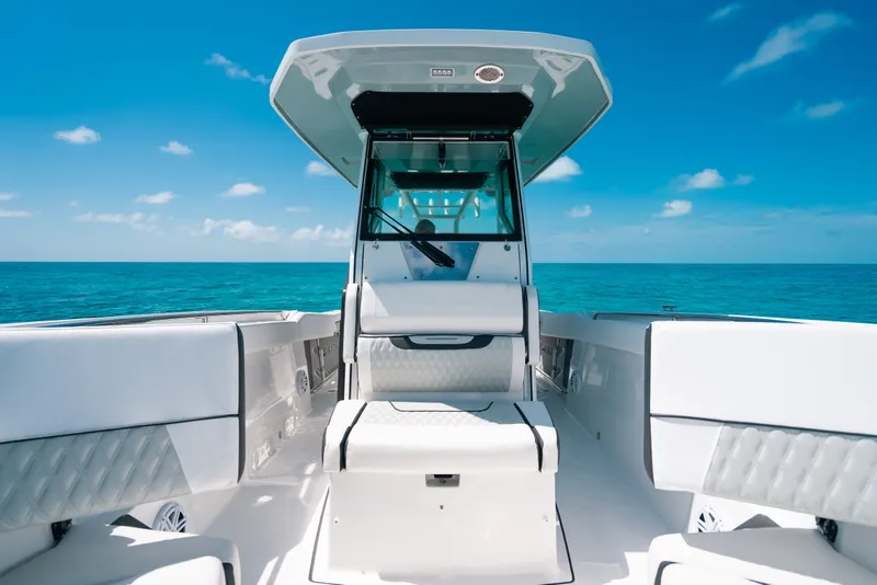 Slide: The Image of 2023 Blackfin 272 CC boat interior with ocean view and clear blue sky. - 28