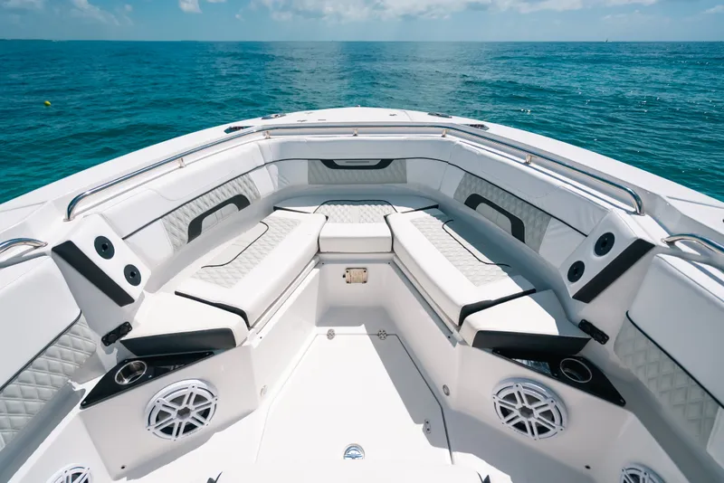 Slide: The Image of 2023 Blackfin 272 CC boat interior with luxurious seating and ocean view. - 75