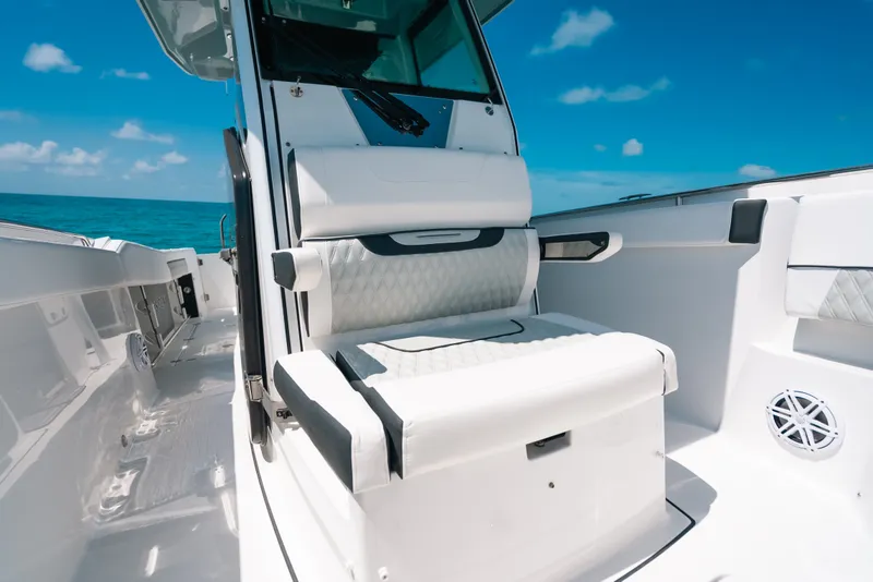 Slide: The Image of 2023 Blackfin 272 CC boat interior with luxurious seating and ocean view. - 71