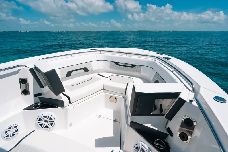 Slide: The Image of 2023 Blackfin 272 CC boat interior with luxurious seating on open water. - 73