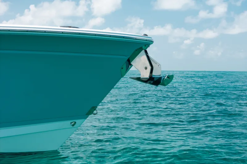 Slide: The Image of 2023 Blackfin 272 CC boat on calm ocean waters under a clear sky. - 36