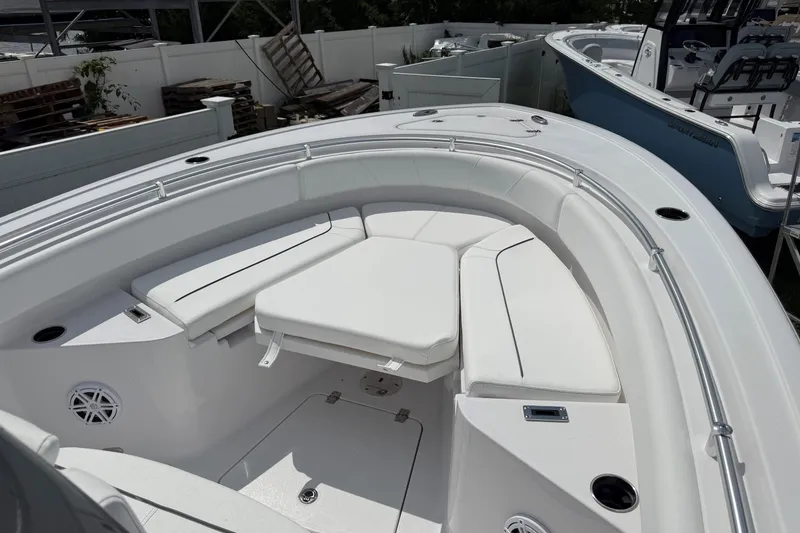 Slide: The Image of 2027 Sportsman Heritage 231 Center Console boat with spacious seating and sleek design. - 17