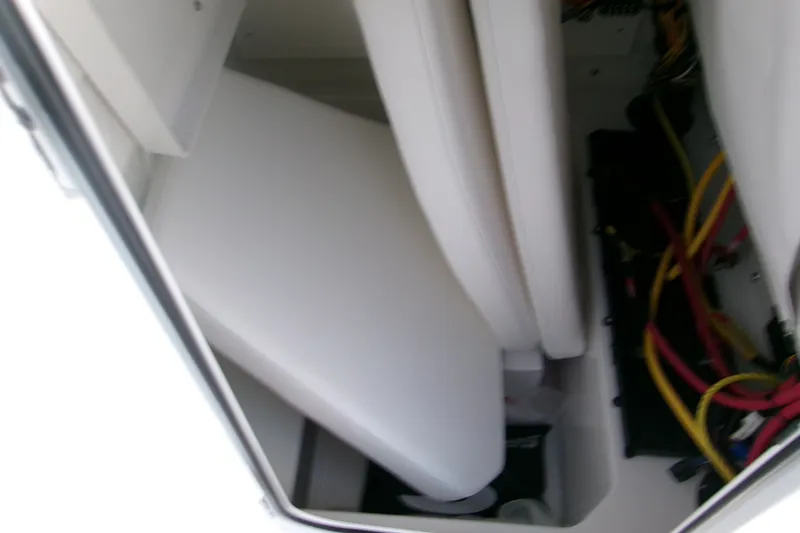 Slide: The Image of Interior view of a 2027 Sportsman Open 232 Center Console boat wiring. - 18