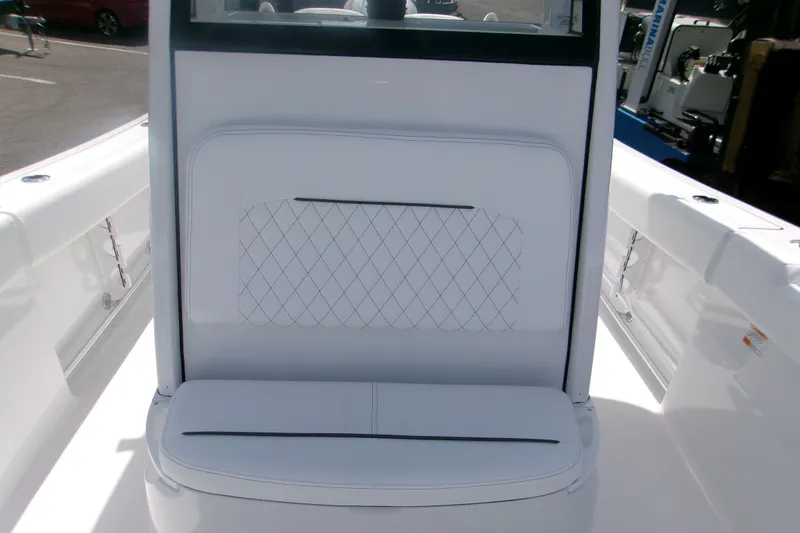 Slide: The Image of 2027 Sportsman Open 232 Center Console boat seat with diamond-patterned upholstery. - 11