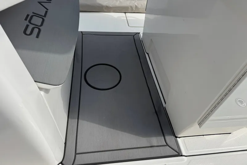 Slide: The Image of Interior view of 2026 Solace 32CS boat, featuring sleek design and modern flooring. - 15