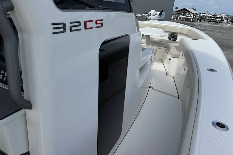 Slide: The Image of 2026 Solace 32CS boat interior, showcasing sleek design and spacious seating area. - 19