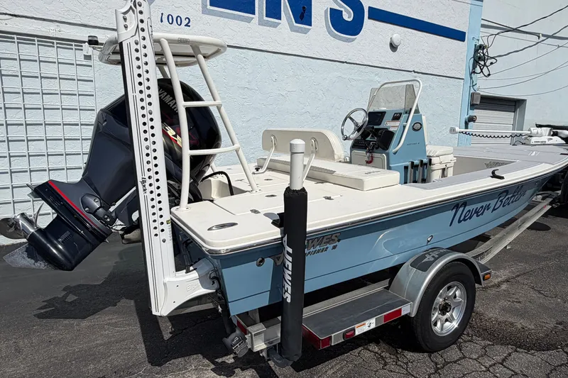 Slide: The Image of 2020 Hewes Redfisher 18 boat with Yamaha outboard motor on trailer. - 10