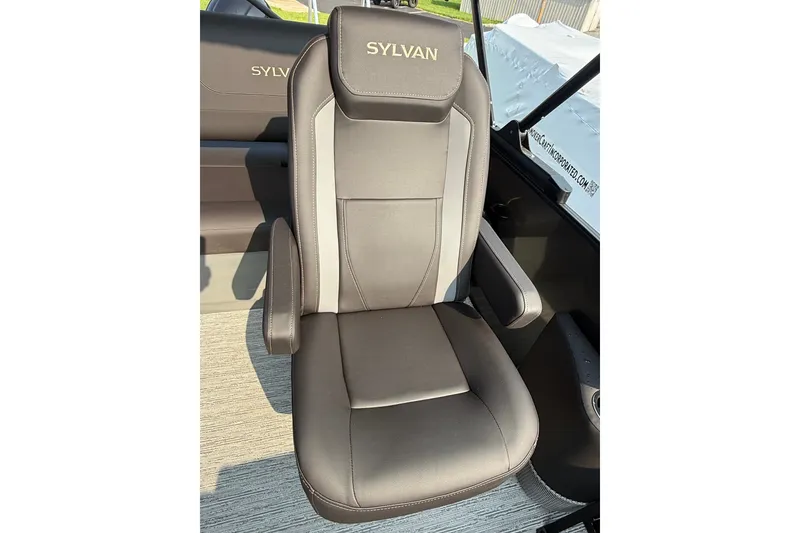 Slide: The Image of Luxurious Sylvan X1 CLZ DH 2026 boat seat with armrests and sleek design. - 21