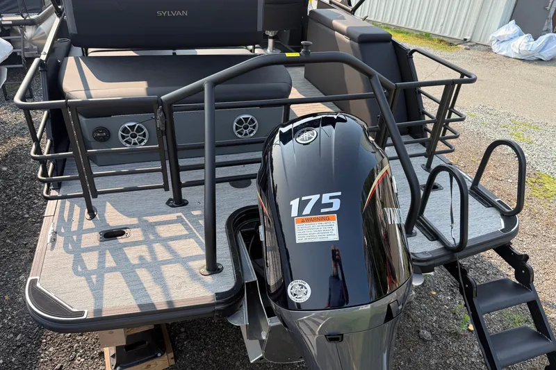 Slide: The Image of 2026 Sylvan X1 CLZ DH boat with Yamaha 175 engine, rear deck view. - 6