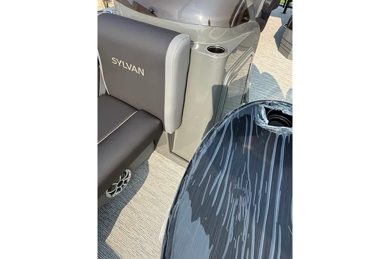 Slide: The Image of Interior of 2026 Sylvan X1 CLZ DH boat with sleek seating and modern design. - 19