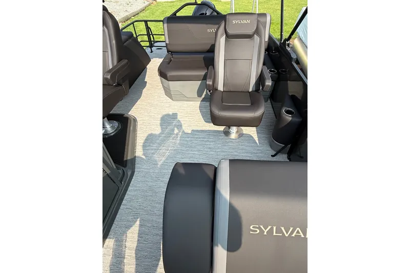 Slide: The Image of Interior of 2026 Sylvan X1 CLZ DH boat with luxurious seating and modern design. - 17