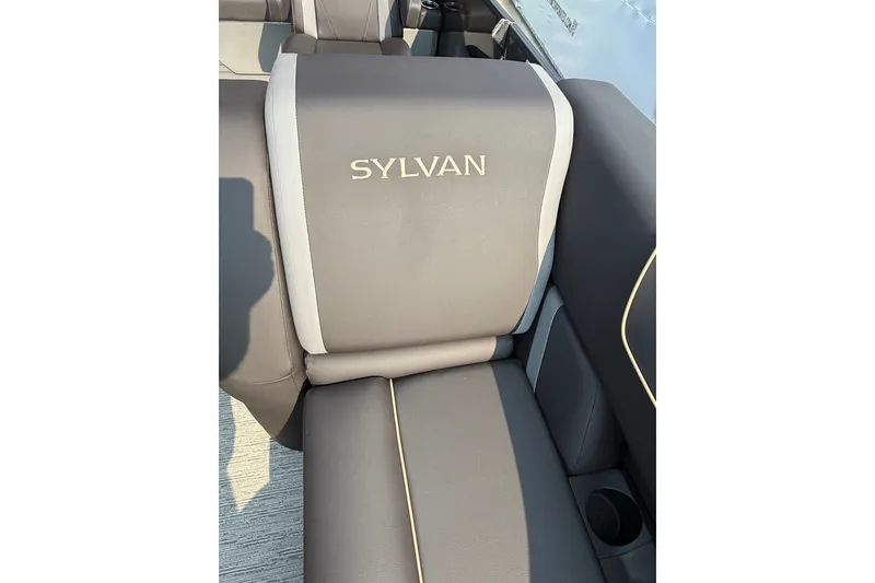Slide: The Image of 2026 Sylvan X1 CLZ DH boat seat with logo, featuring sleek gray upholstery. - 18