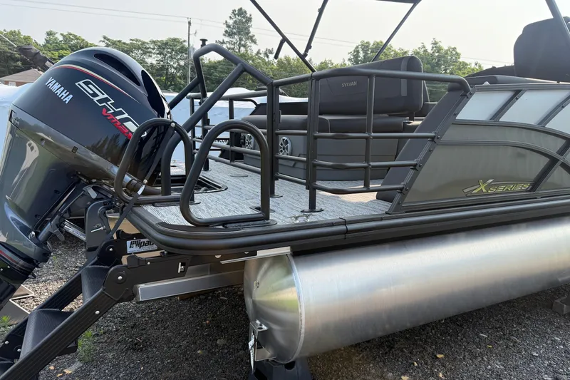 Slide: The Image of 2026 Sylvan X1 CLZ DH pontoon boat with Yamaha engine, X Series branding. - 3