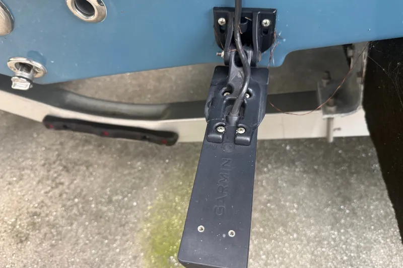 Slide: The Image of Garmin transducer mounted on 2025 Bulls Bay 2200 XS boat hull. - 13