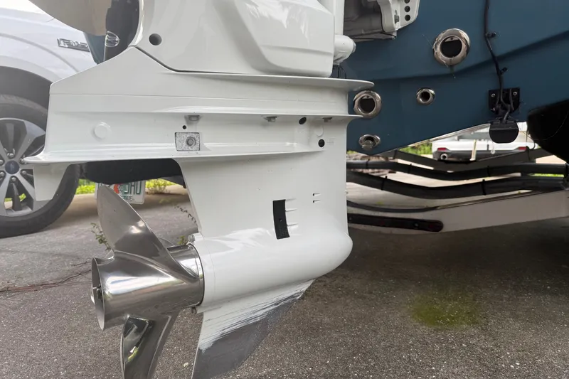 Slide: The Image of Close-up of a 2025 Bulls Bay 2200 XS boat propeller and motor on a trailer. - 9