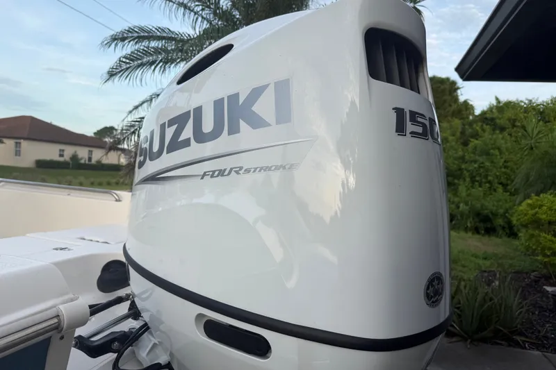 Slide: The Image of Suzuki 150 horsepower outboard motor on 2025 Bulls Bay 2200 XS boat. - 8