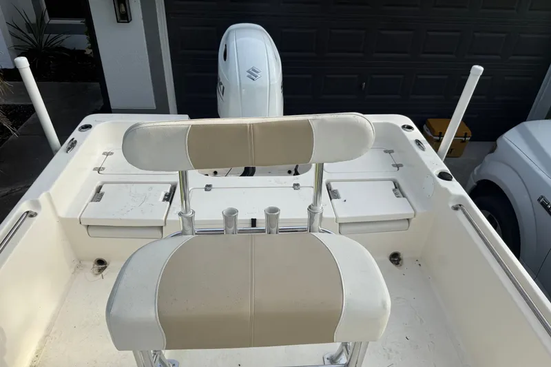 Slide: The Image of 2025 Bulls Bay 2200 XS boat interior with seating and storage compartments. - 26