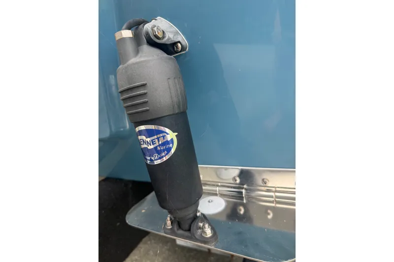 Slide: The Image of Bennett Marine component on 2025 Bulls Bay 2200 XS boat, featuring a blue hull. - 12